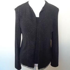 Evening  top with long sleeved jacket.